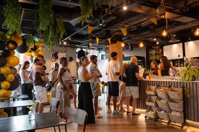 Customers queuing at the counter on Apex Lounge's opening day